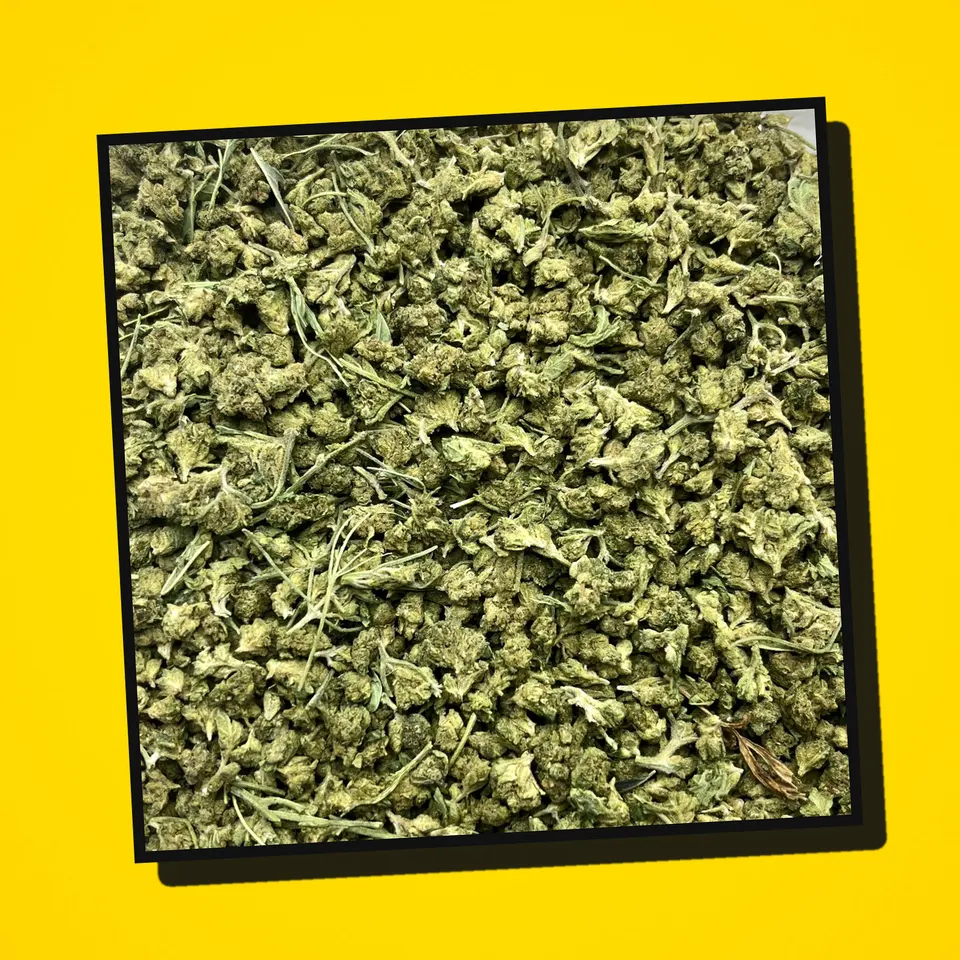 Mixed THCA flower under the flash, smalls
